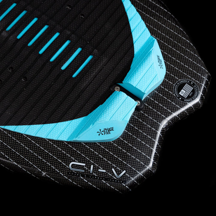 2026 Phase Five Hypsta V2 wake surfboard featuring a textured black surface with blue accents and adjustable fin system.