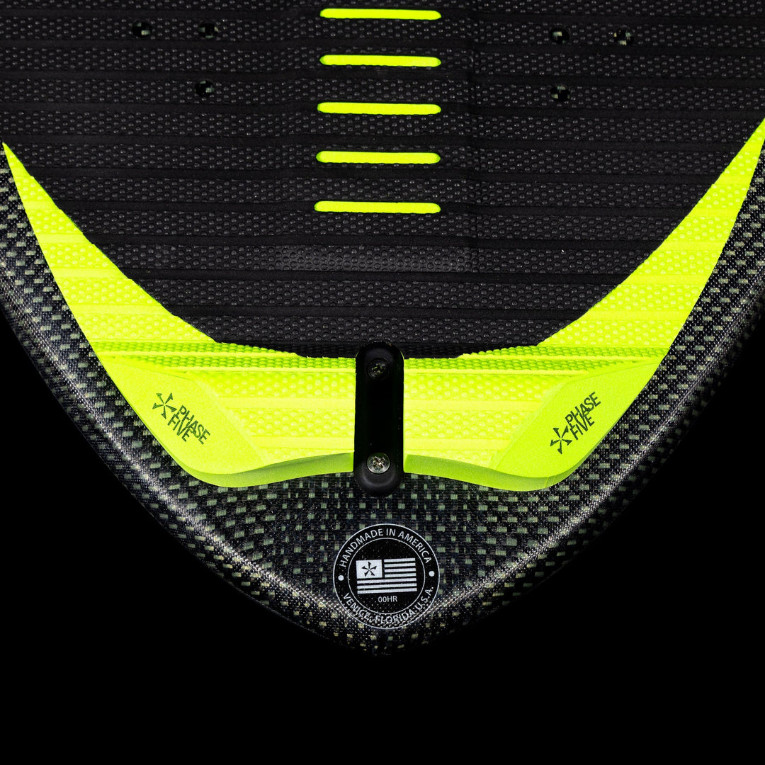 Close-up of the 2026 Phase Five Matrix wake surfboard featuring a textured surface and bright yellow accents.
