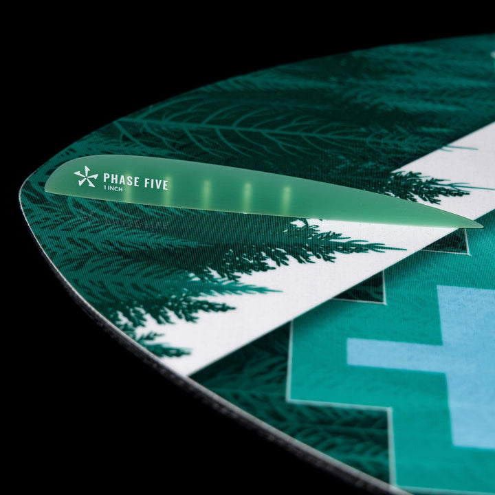 Close-up of the 2026 Phase Five Matrix Pro surfboard showing its vibrant design and fin detail.