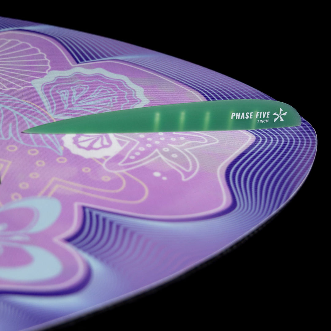 2026 Phase Five Mindset surfboard featuring a vibrant purple design with floral patterns and a green nose.