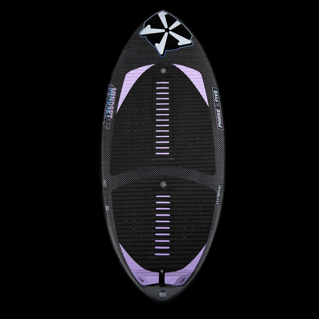2026 Phase Five Mindset surfboard featuring a sleek design with a black and purple color scheme and textured grip pads.