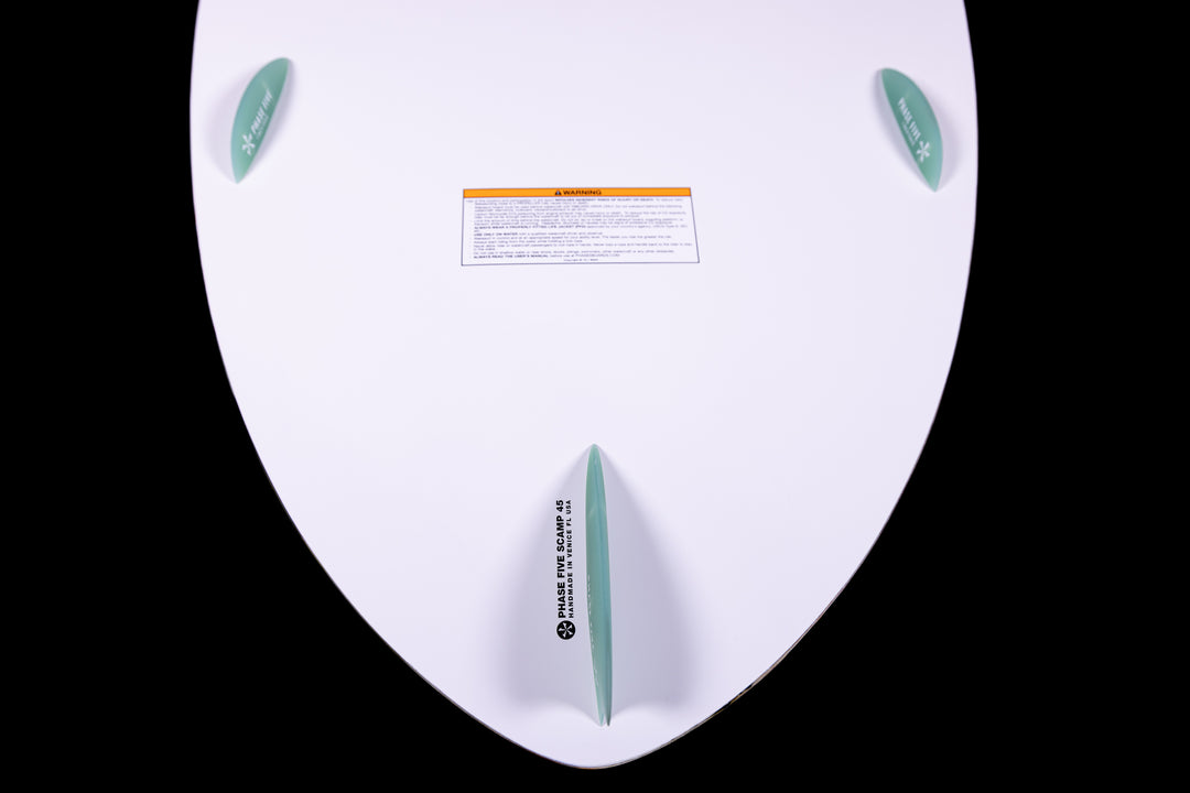 2025 Phase 5 Scamp Skim Board featuring a sleek design and fin setup for optimal performance on the water.