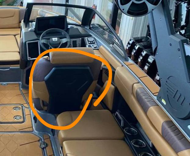 Driver helm seat for Malibu boats, featuring a vacuum-formed design, providing comfort and support for boating adventures.