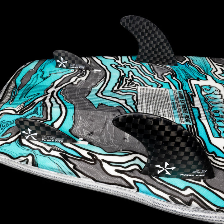 2026 Phase Five Swell wake surfboard featuring a vibrant design and three fins for enhanced performance on the water.