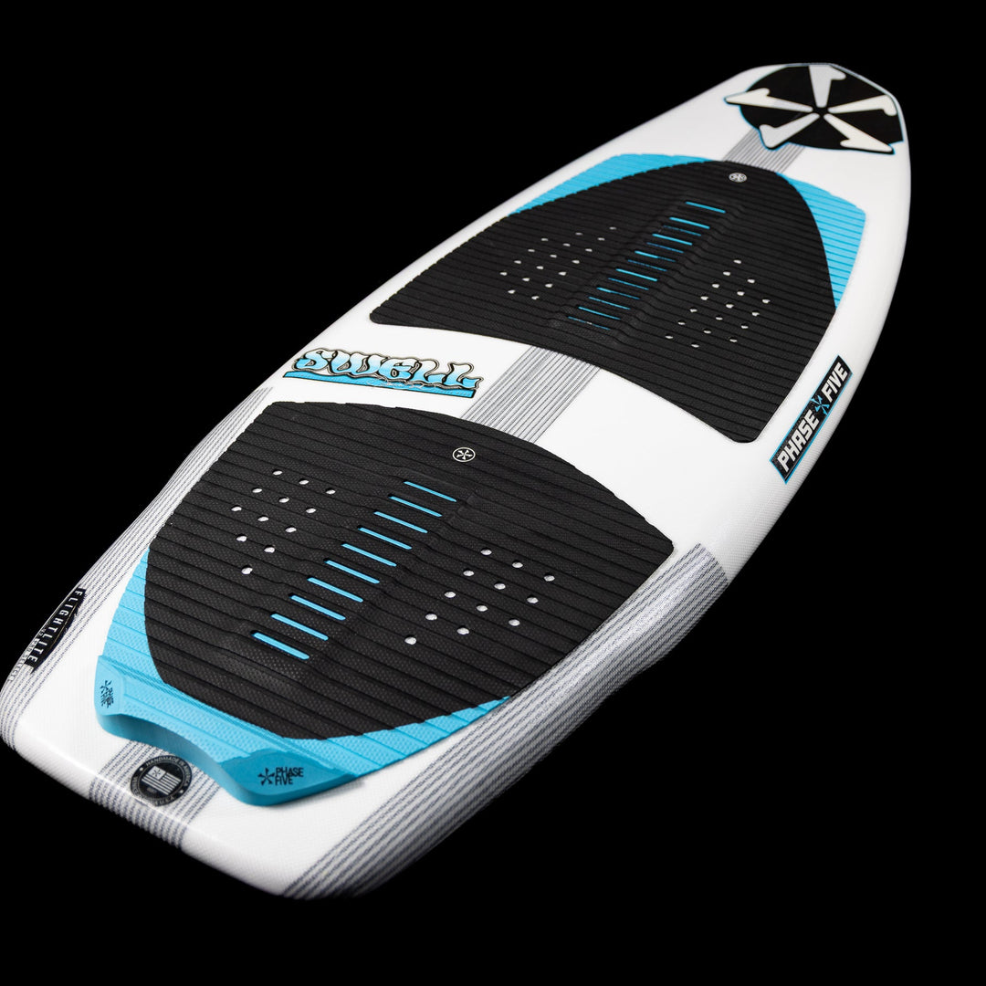2026 Phase Five Swell wake surfboard featuring a sleek design with blue accents and textured grip pads for optimal performance.