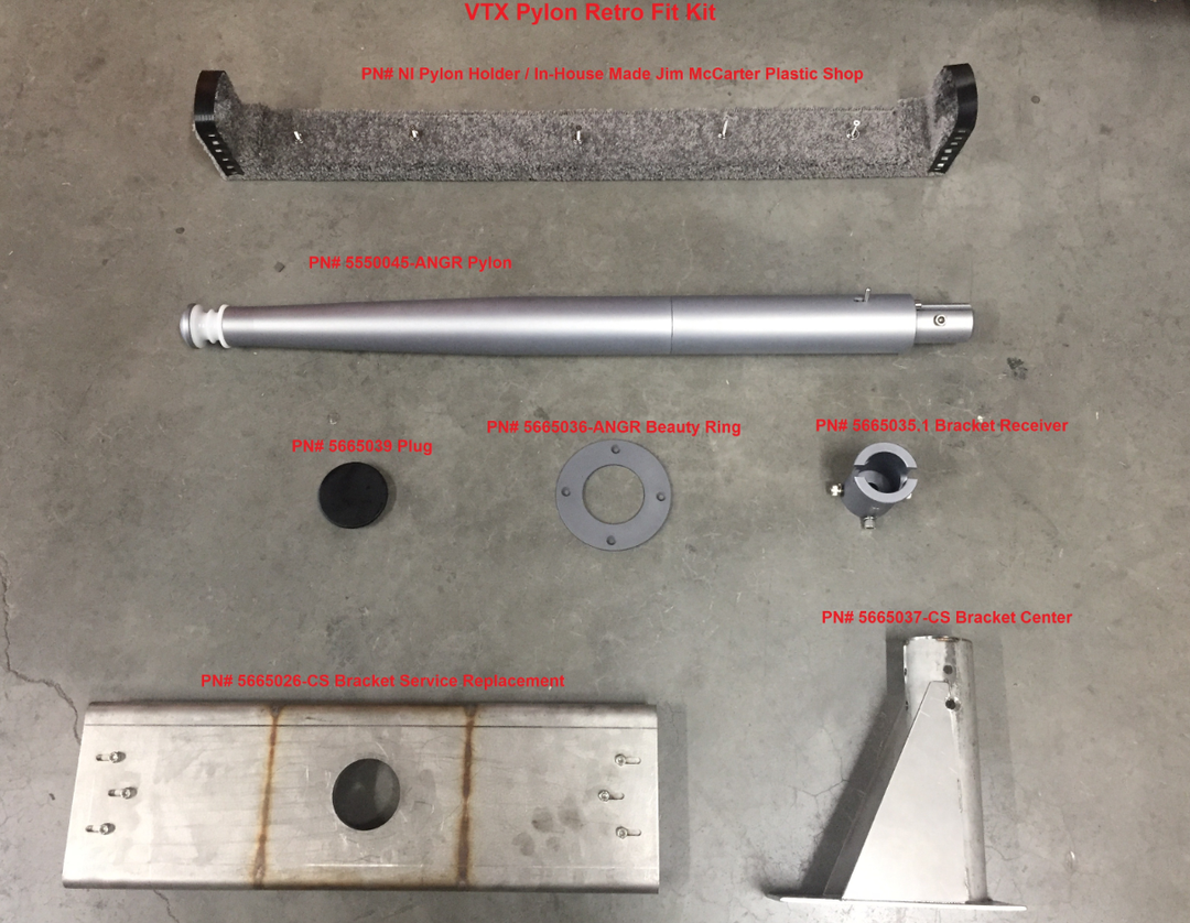 Disassembled Malibu VTX Center Pylon Retro Fit Kit components laid out on a concrete floor, including brackets, pylon, and rings.
