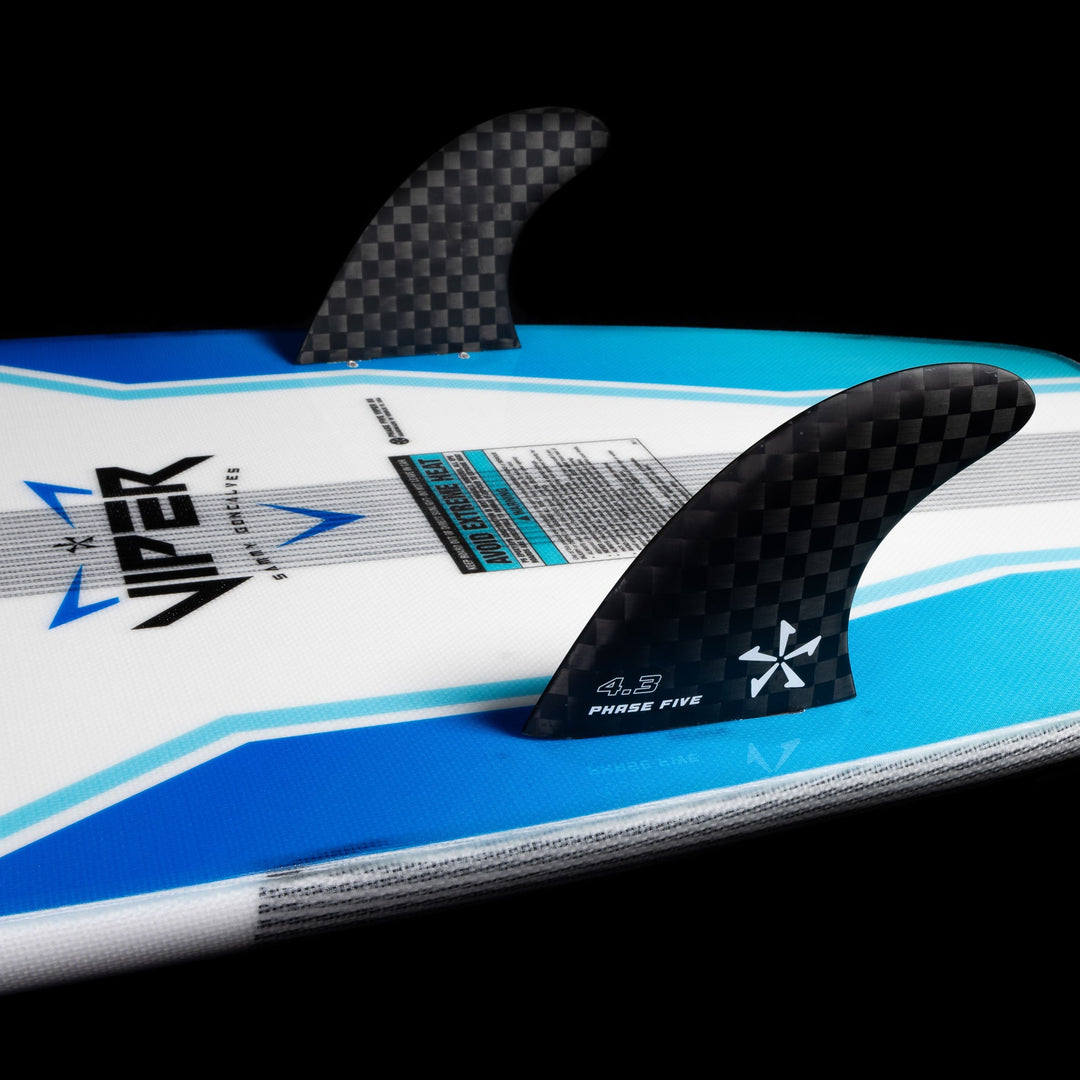 Close-up of the 2026 Phase Five Viper surfboard showcasing its sleek design and carbon fins for enhanced performance.