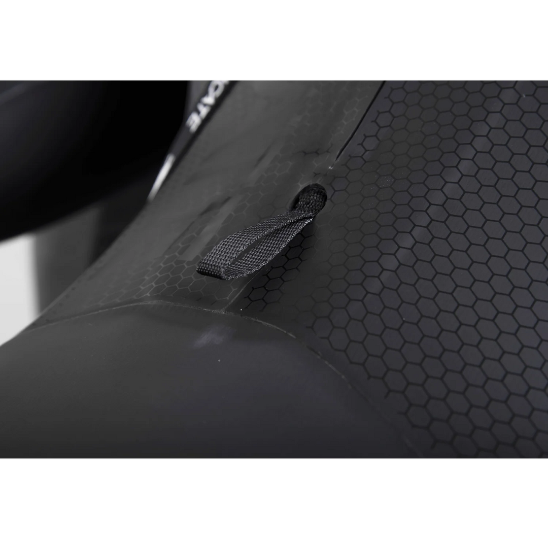 Close-up of the Syndicate DRY-FLEX Wetsuit showcasing its flexible material and unique hexagonal texture for optimal performance.