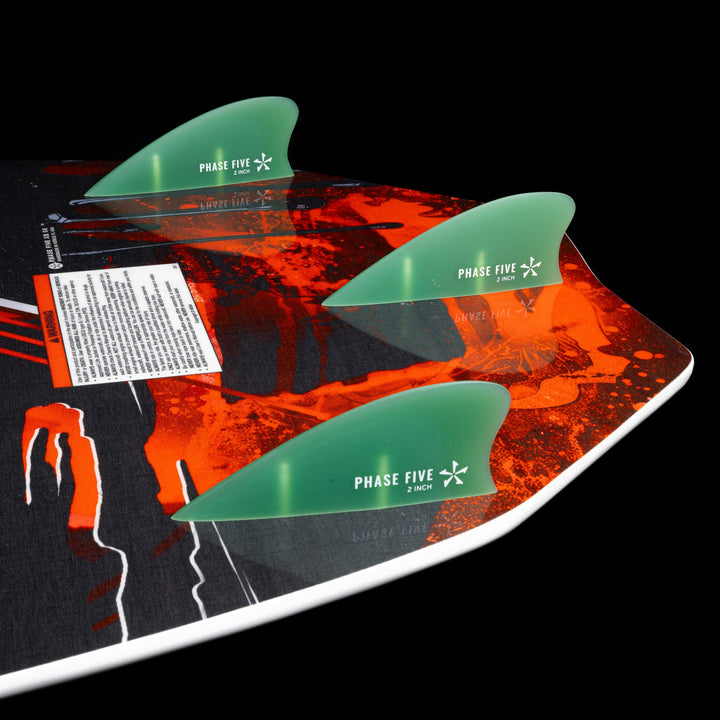 Close-up of the 2026 Phase Five XB wake surfboard showing its vibrant design and three green fins for enhanced performance.