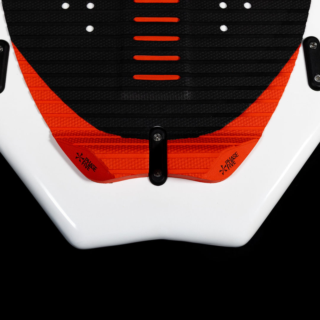 Close-up of the 2026 Phase Five XB wake surfboard showing its textured grip and vibrant design elements.