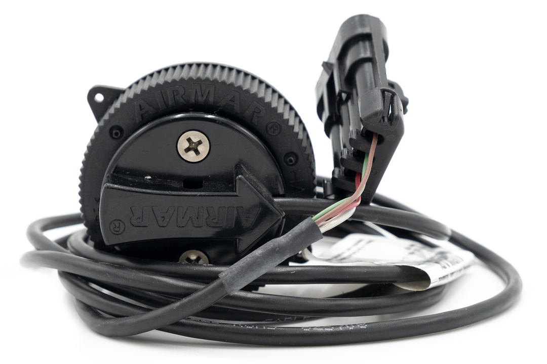 Airmar paddle wheel speed sensor with black plastic housing, wiring, and mounting components for marine speed measurement.