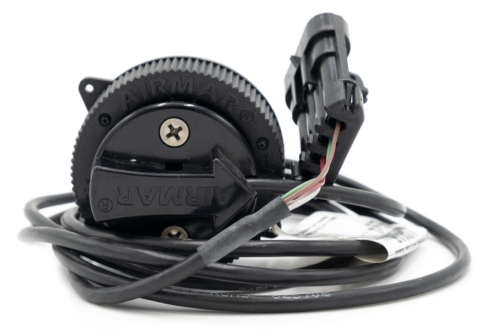Airmar paddle wheel speed sensor with black plastic housing, wiring, and mounting components for marine speed measurement.