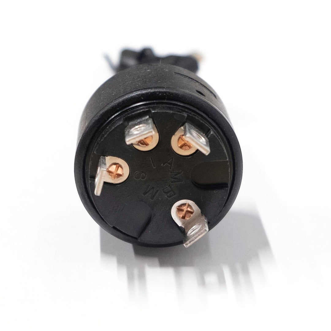 Ignition switch for Malibu vehicle, featuring multiple metal contact pins and a black plastic housing, used for starting the car.