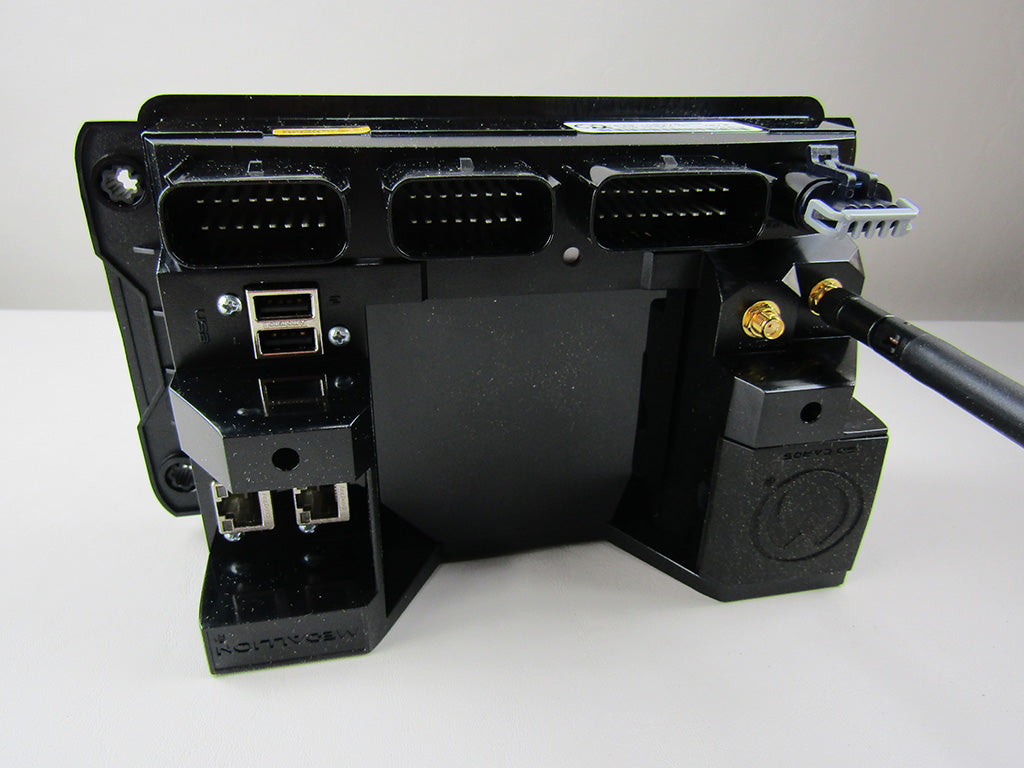 Front view of the Malbu Viper II Display showing multiple ports, connectors, and a black casing with gold and silver accents.