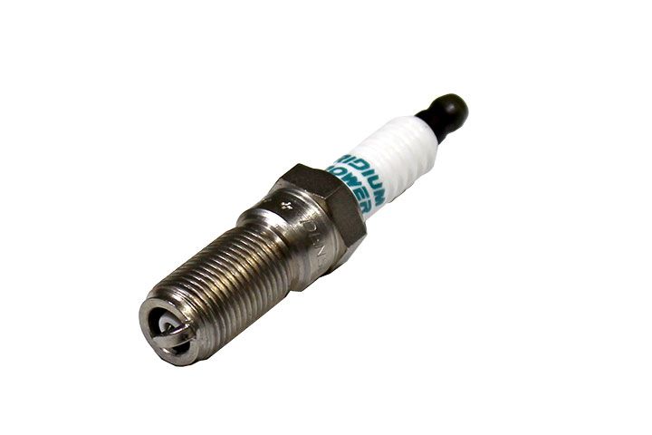 Spark plug for Indmar Ford 6.2 575 engine, with metal threading, white insulator, and black tip.