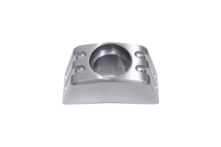Aluminum back-up camera mount with a central hole for securing a camera, designed for vehicle rearview systems.