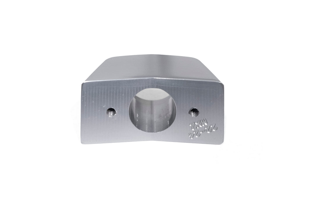 Aluminum back-up camera mount with central hole and two side screw holes for secure installation.