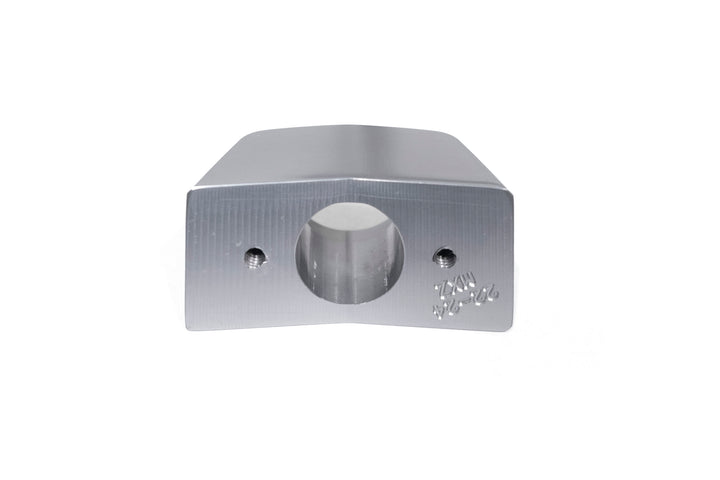 Aluminum back-up camera mount with central hole and two side screw holes for secure installation.