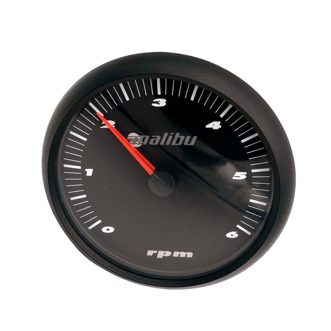 Malibu 5" tachometer for 2003-2004 vehicles, black dial with white markings and red needle, measuring RPM up to 6,000.