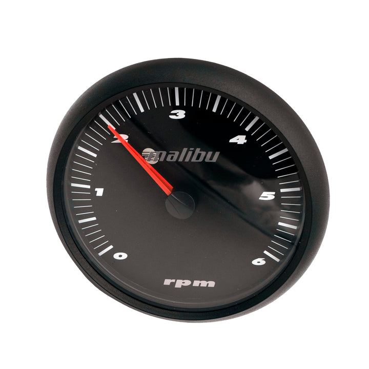 Malibu 5" tachometer for 2003-2004 vehicles, black dial with white markings and red needle, measuring RPM up to 6,000.