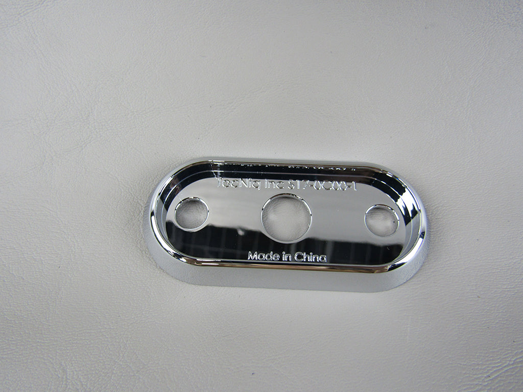 Chrome bezel light clearance plate with three holes, made in China, for automotive or machinery use.