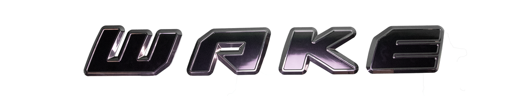 Malibu Boats "Wake" decal in black with a reflective chrome outline, designed for boat decoration and branding.