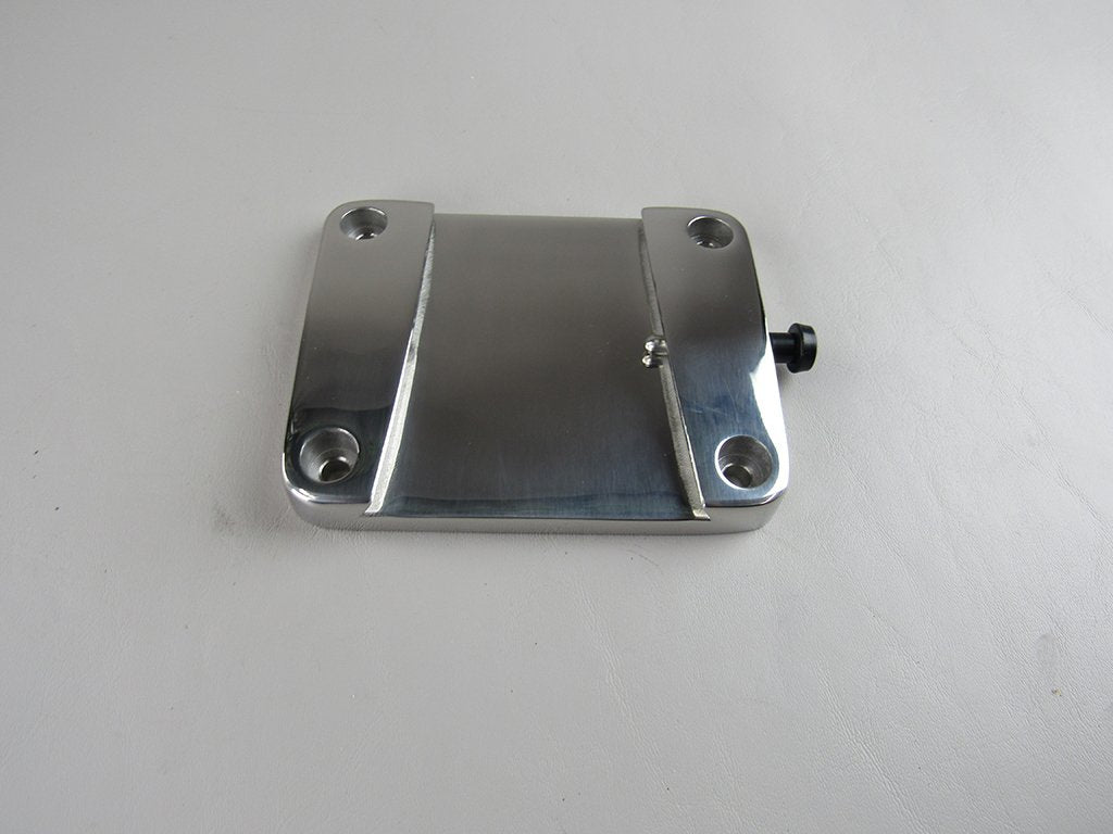 Side-mount lock block assembly made of 304 stainless steel, featuring a rectangular base with four mounting holes and a side locking mechanism.