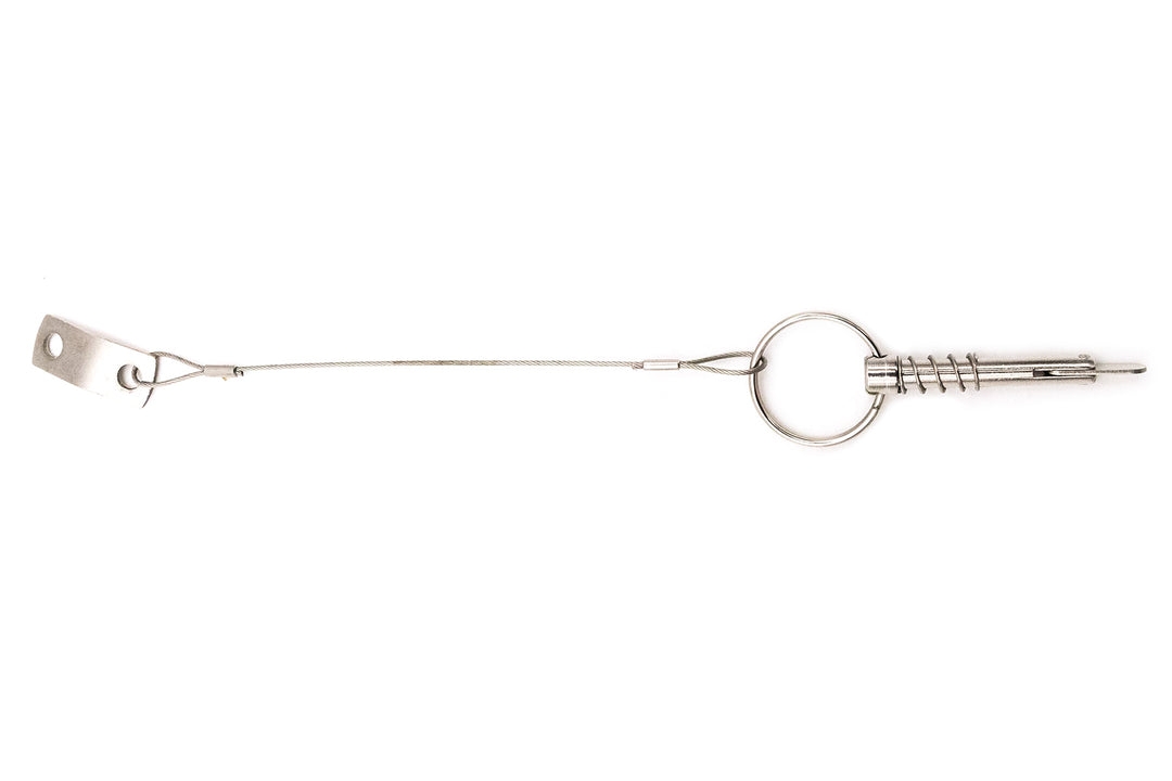 Pull pin with cable, spring, and large tab lock for secure fastening and easy removal.