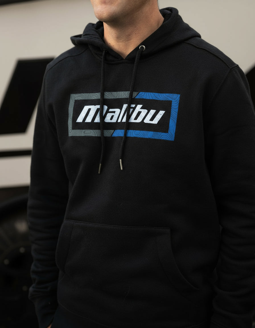 Black hoodie with a "Malibu" logo on the chest, featuring a drawstring hood and front kangaroo pocket.