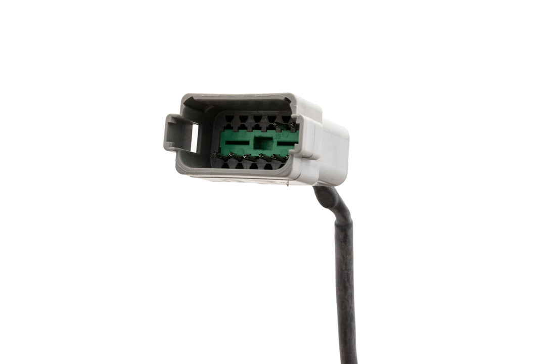 Close-up of a white electrical connector labeled Malibu Control, Mefi-6, 13-14, with internal green and black components.