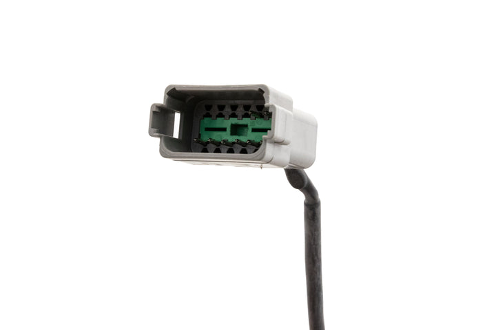 Close-up of a white electrical connector labeled Malibu Control, Mefi-6, 13-14, with internal green and black components.