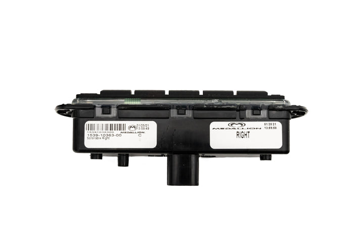 Right Mux Switch Module for vehicle control, featuring multiple buttons and a central connector, labeled "RIGHT" on the side.