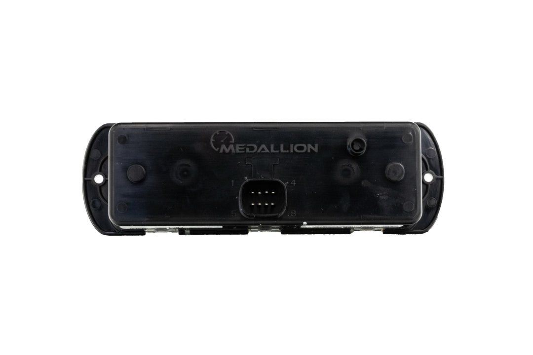 Black left Mux switch module with connector port, mounted on a white background, labeled "Medallion.