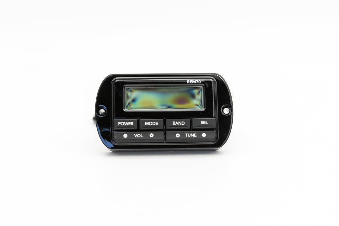 Black stereo transom remote control with digital display and buttons for power, mode, band, volume, and tuning.