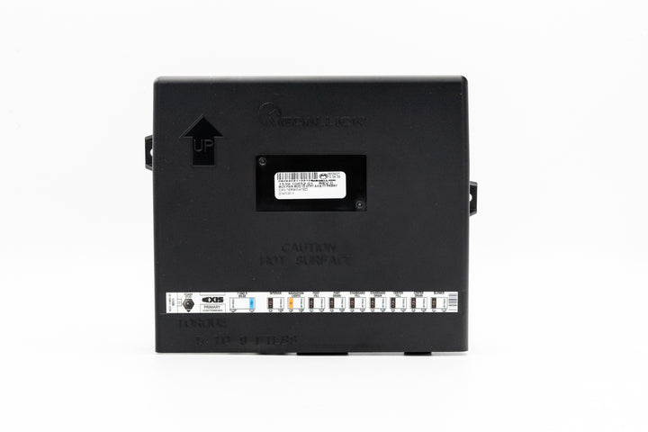 Power module primary for Axis 17-21, black rectangular device with labels, arrow indicating upward direction, and caution warning.