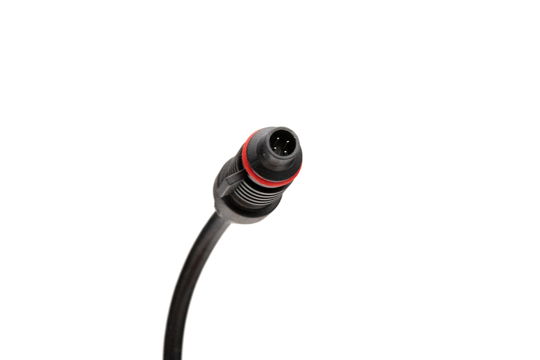 Close-up of a 25ft camera extension cable connector with black and red accents, isolated on a white background.