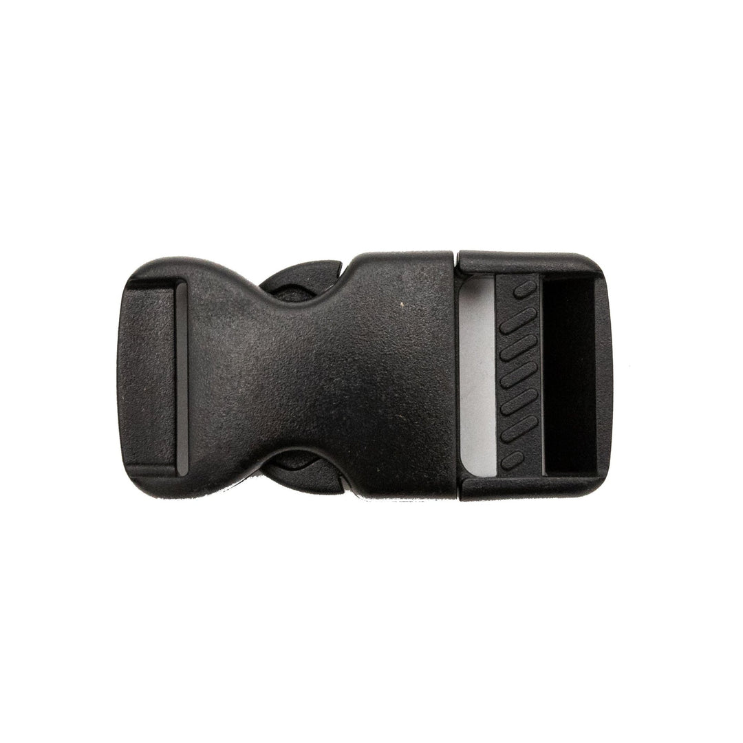 Alt text: Close-up image of a 1-inch black plastic cover tie-down buckle, showing the clasp and adjustment details on a white background.