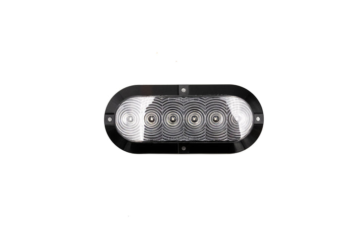 Oval red LED brake light with a transparent lens and black housing, designed for vehicle safety and signaling.