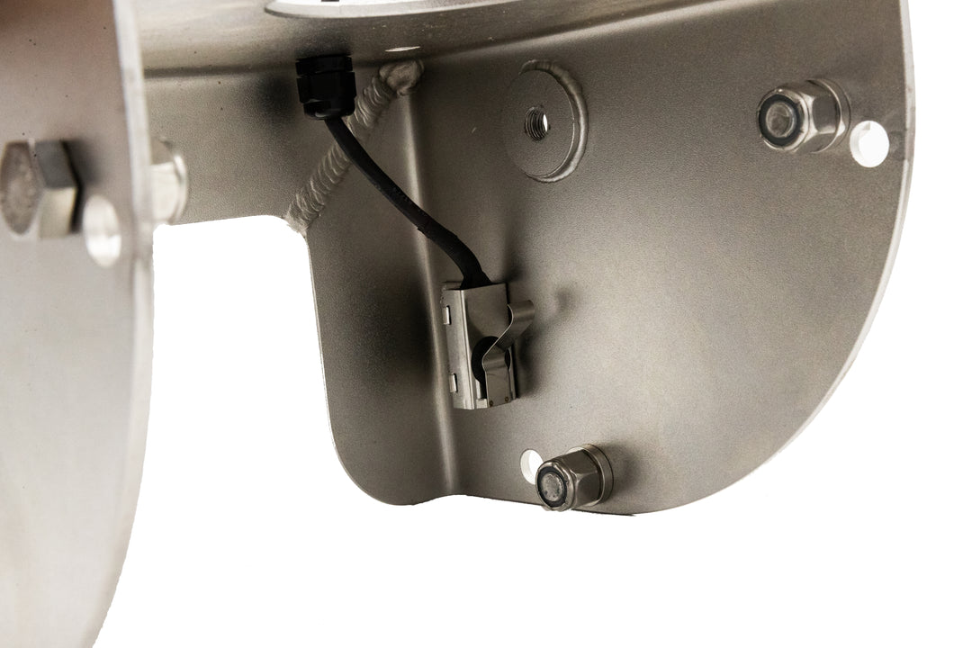 Wedge transom bracket with CPI sensor, shot-peened stainless steel, mounted inside a metallic enclosure with bolts and wiring.