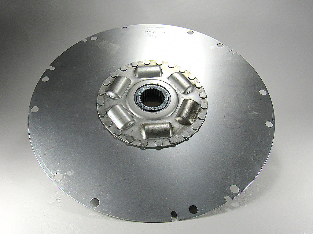 VRS damper assembly with 7200 in-lbs torque, metallic circular component featuring central splined hub and surrounding mounting holes.