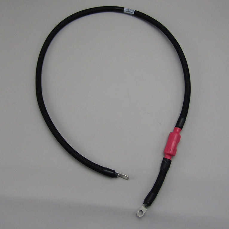 Ground harness for alternator, Gen V, 115A, with ring terminals and protective black sleeve.