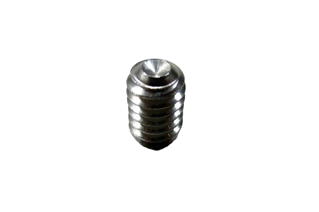 Close-up of a small, shiny metal tower handle set screw with threaded body on a white textured surface.