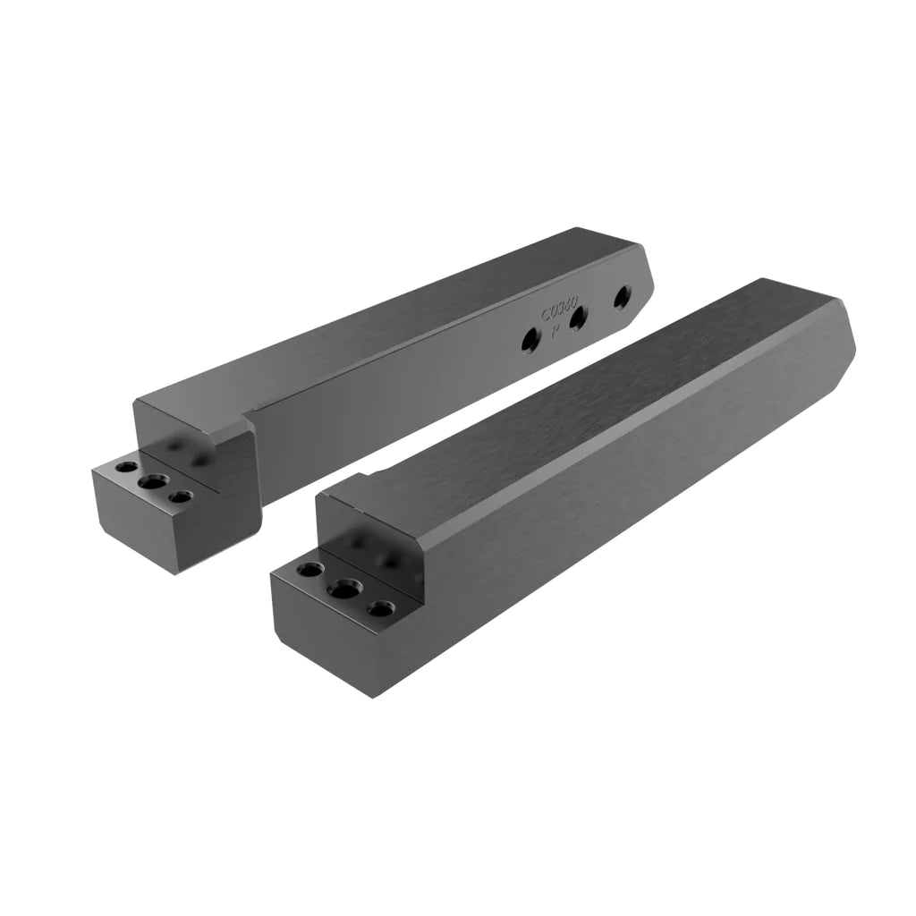 Skylock Pro-4 and Springlock Tower Adapter components, black metal blocks with multiple screw holes for secure mounting.