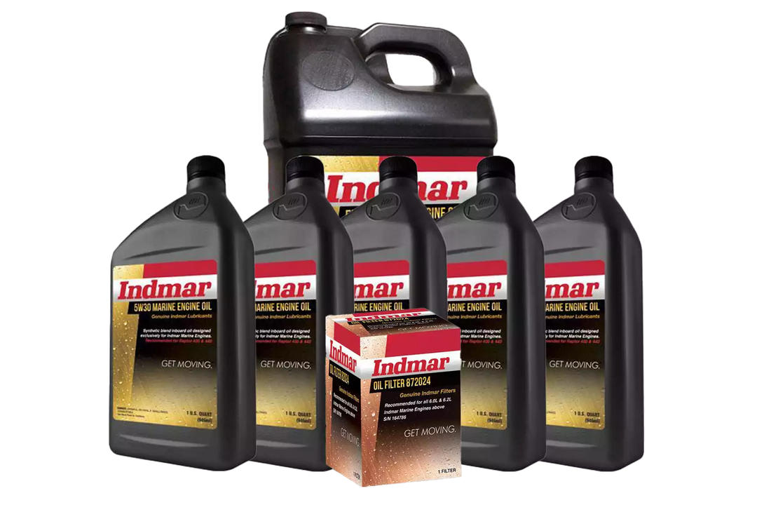 Set of five Indmar marine engine oil bottles and a filter box, all labeled for oil change and maintenance.