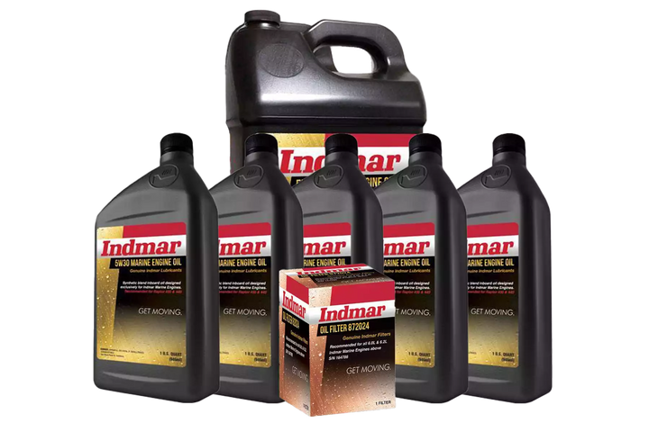 Set of five Indmar marine engine oil bottles and a filter box, all labeled for oil change and maintenance.