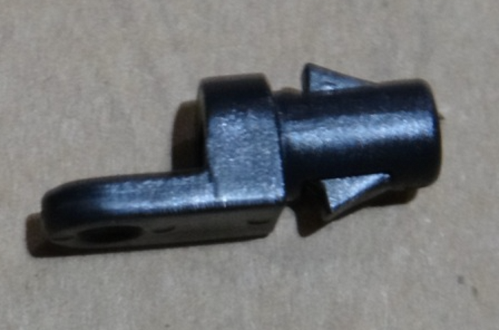 Plastic screw eye strap end for 1/4-inch poly cord, used to secure and attach cords or ropes.