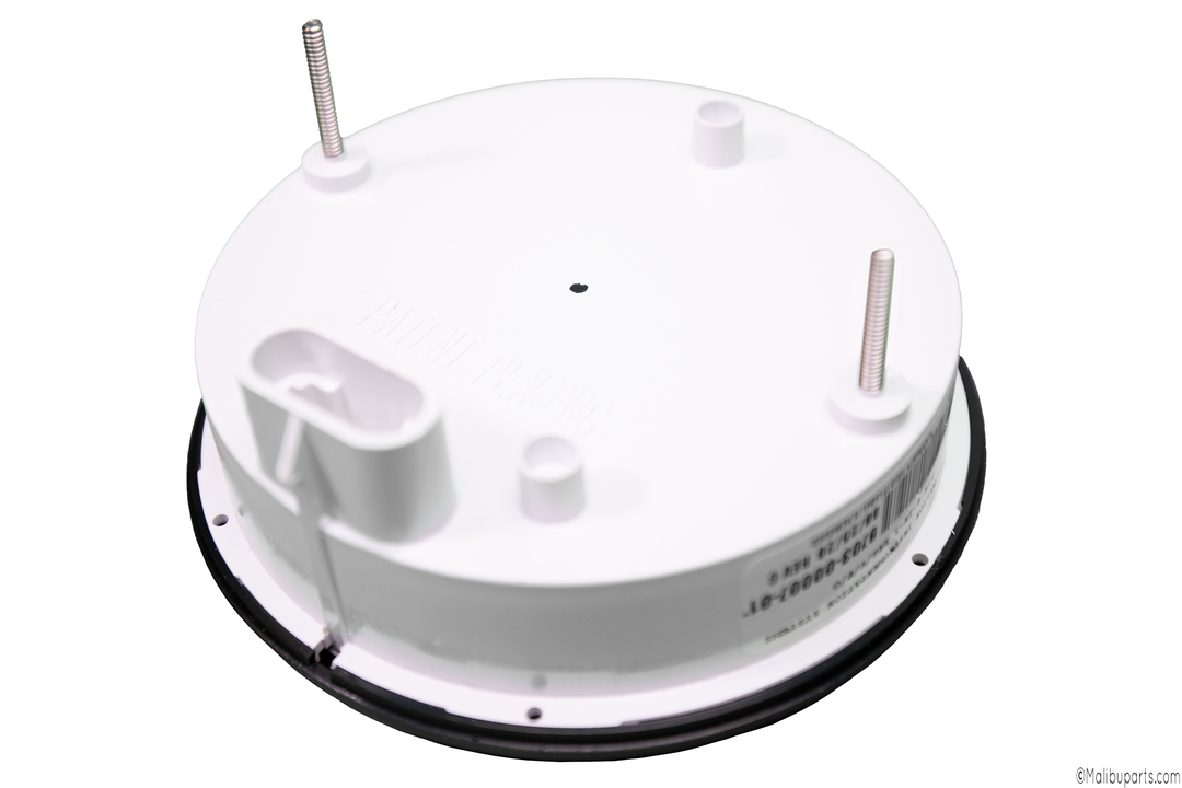 White 4-in-1 gauge with multiple ports and metal mounting rods, used for measuring and monitoring in various applications.
