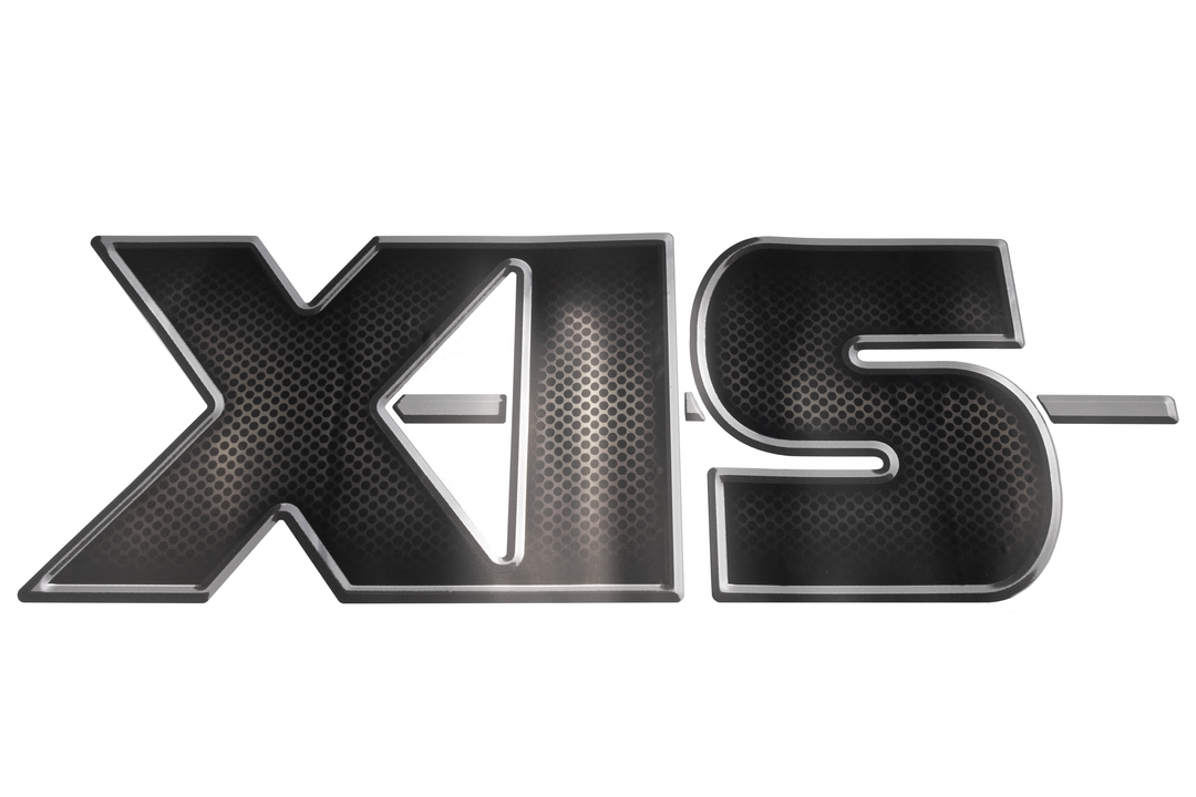 Black and silver "XIS" decal with a textured, honeycomb pattern and metallic outline, designed for vehicle or product branding.