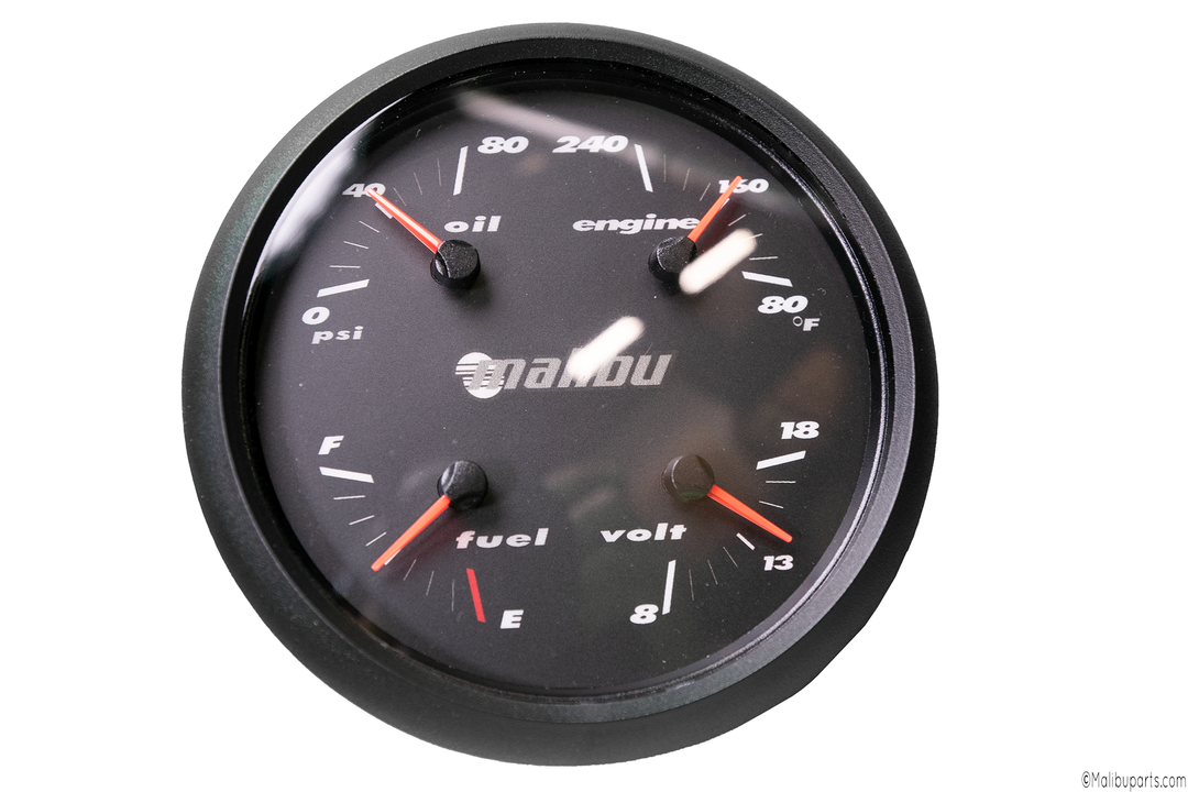 Four-in-one automotive gauge displaying oil pressure, engine temperature, fuel level, and voltage.