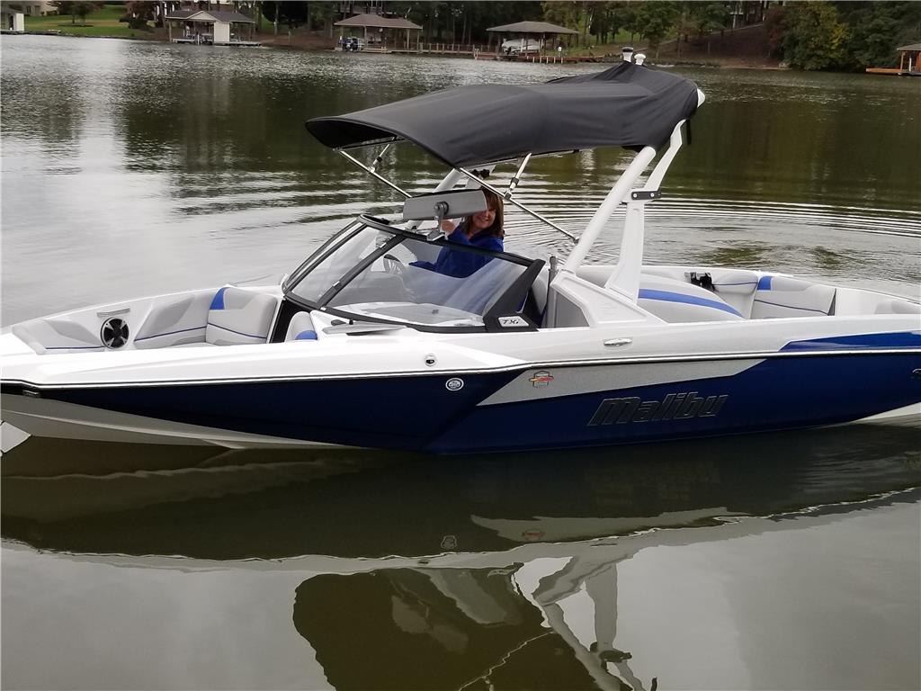 A Malibu boat with TXI Bimini Complete for XTP Tower, 17-22&